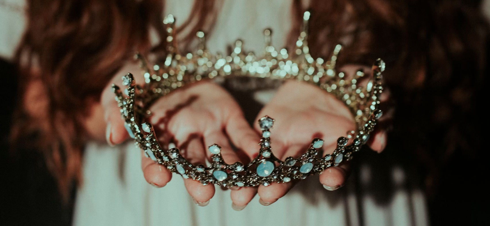 Woman holds crown